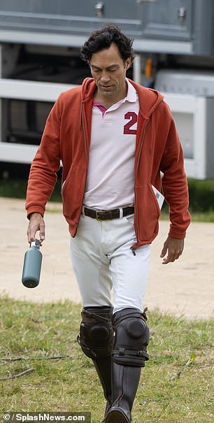 His onscreen rival Alex Hassell was also seen on set, sporting polo gear as he reprised his role as Rupert Campbell-Black