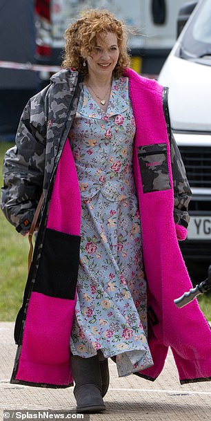 The actress looked very cosy as she sported the enormous coat teamed with slouchy boots