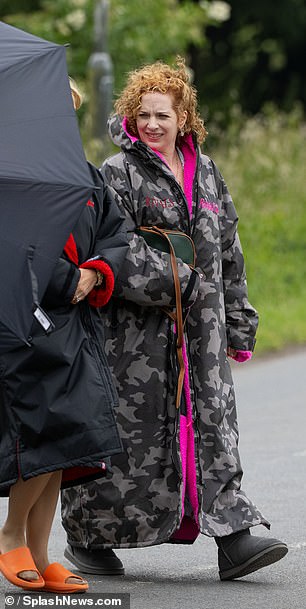 She was seen chatting away with another cast member in between scenes