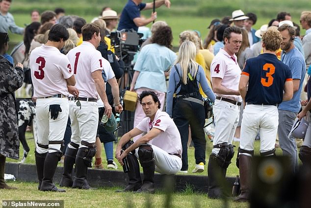 At one point, the actor looked rather glum amid filming for polo scenes