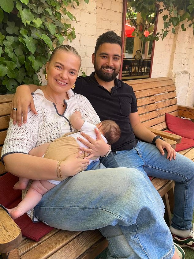Georgia (pictured with Chris while breastfeeding Teddy) says she planned to nurse her eldest son for a year but stopped naturally at around nine months when her milk dried up
