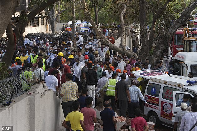 Search and rescue teams respond to the scene of a plane crash in Ahmedabad, India, Thursday, June 12