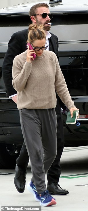 She also carried a green notebook