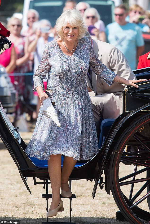 Camilla was one of Lisa Kay's first customers. Pictured: Camilla, then the Duchess of Cornwall, wearing the shoes at Sandringham Flower Show in 2018