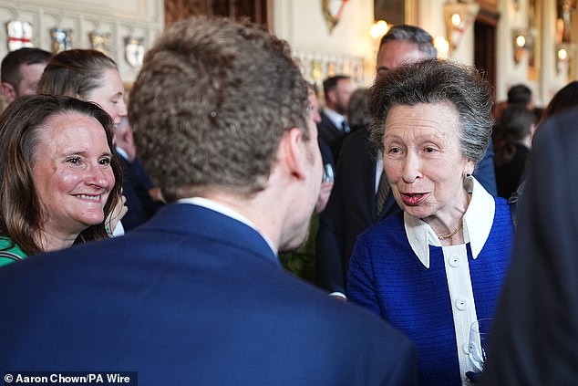 Also in attendance was Princess Anne, sporting a navy blue ensemble accentuated with white detailing