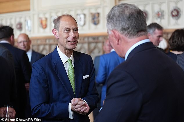 Prince Edward beamed as he chatted with guests, sporting a colourful lime green tie for the occasion