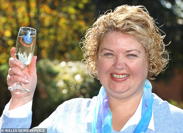 Former ballet dancer Helen Ford (pictured), 54, died in a collision with a train after years of struggling to cope with a £500,000 scratchcard bonus , an inquest heard