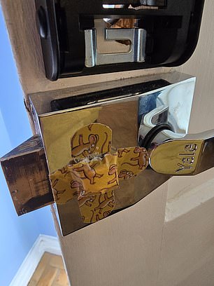 Pictured: A damaged front door lock