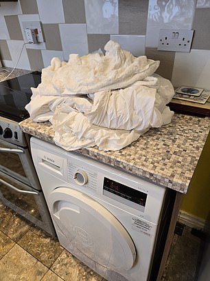 Pictured: Piles of unwashed laundry left at the property