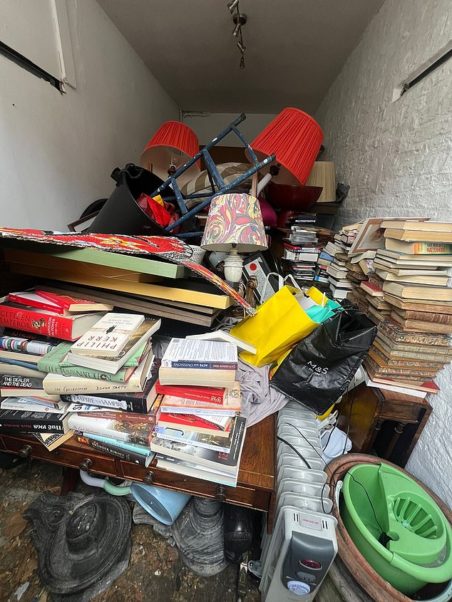 Pictured: Piles of Ms Loyd's belongings which were thrown into a garage by the tenant, which they should not have access to, according to the landlord