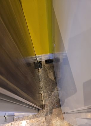 Pictured: Dirty tiles in the kitchen