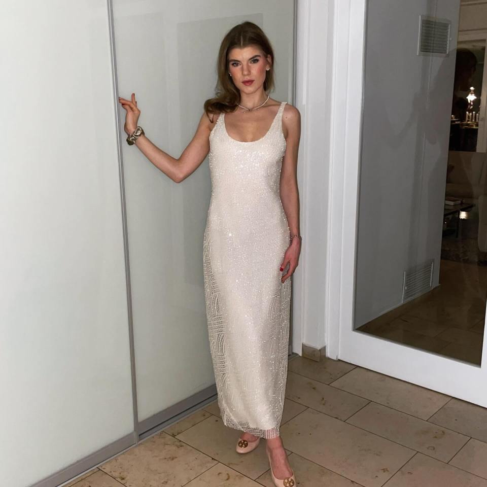 Woman in a sequined gown.