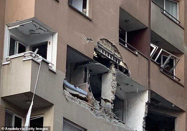 A view of a damaged building on Farahzadi Boulevard in Tehran
