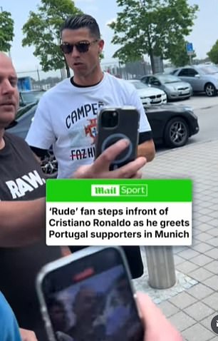 Ronaldo put his hand on the supporter after he stepped in front of him