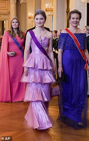 Princess Catharina-Amalia, Princess Elisabeth and Queen Mathilde of Belgium walk through The Great Hall before the gala dinner for Norway's Princess Ingrid Alexandra at the Palace in Oslo