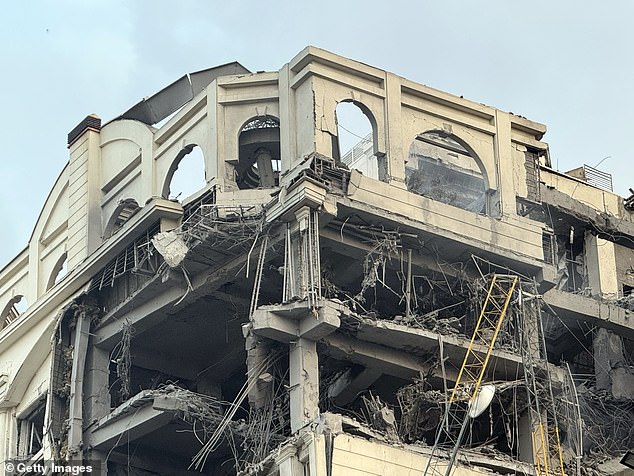 A destroyed building is shown following a massive Israeli airstrike in the Kamranieh neighborhood on June 13, 2025 in Tehran, Iran