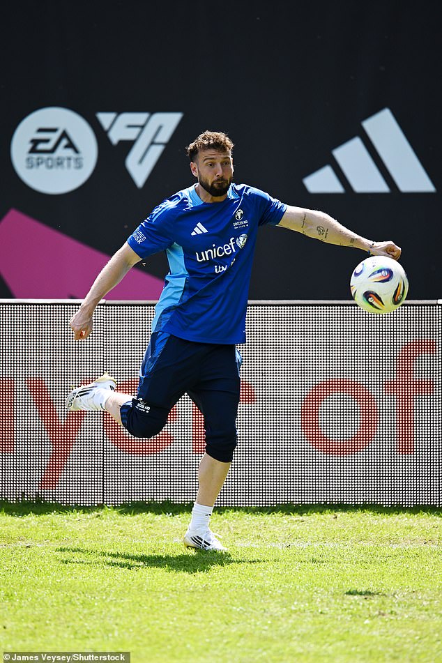 The Made In Chelsea star, 32, looked in high spirits as he kicked a ball on the pitch in the Unicef kit