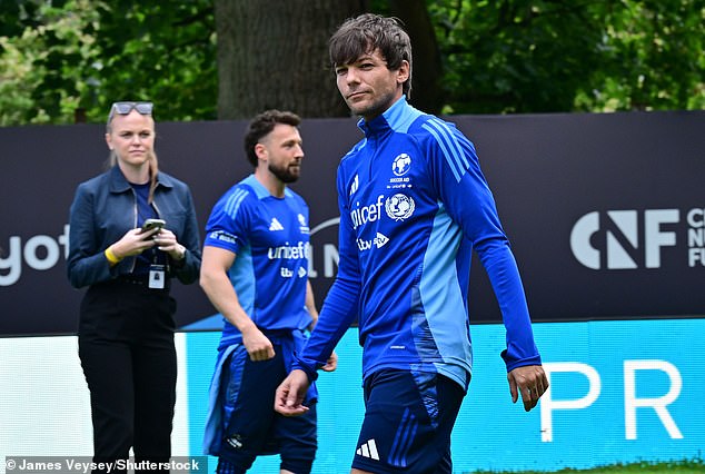 Louis Tomlinson and Sam Thompson were seen desperately trying to avoid eye contact when they finally came face to face at Soccer Aid training on Thursday