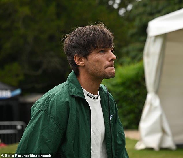Louis was pictured checking out the training grounds