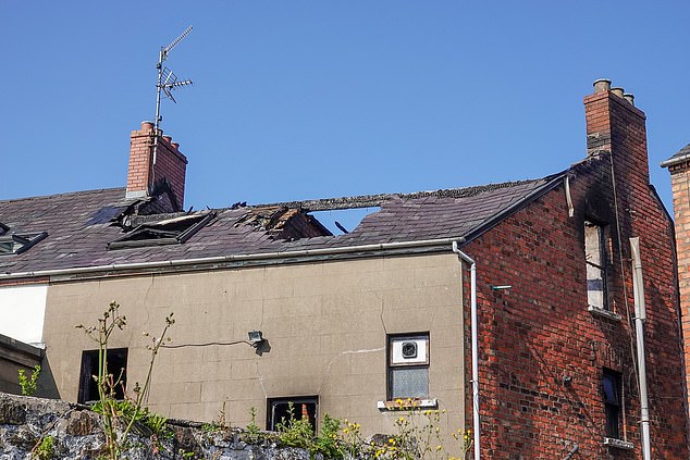 Damage to a house in Ballymena after three nights of rioting in the streets