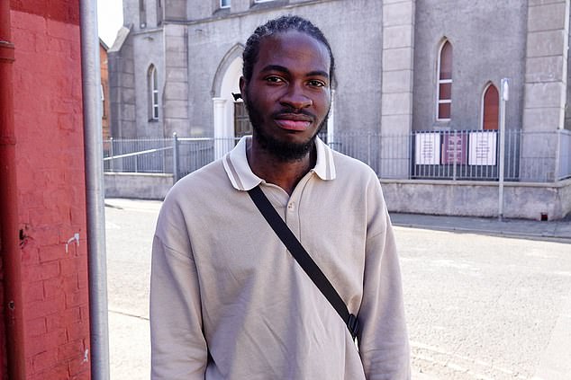 Nigerian-born Toby Adeyemi, 26, who is a support worker for people with disabilities, insisted that the Clonavon Road area was 'a relatively peaceful and friendly neighbourhood'