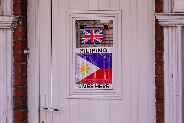 Jhonsen Fabros, 26, told how he has put a sign on the front door, saying those inside were Filipino, to try and protect their home from rioters who are targeting Roma people