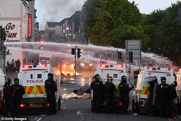 Police use water cannons during protests on June 10 in Ballymena