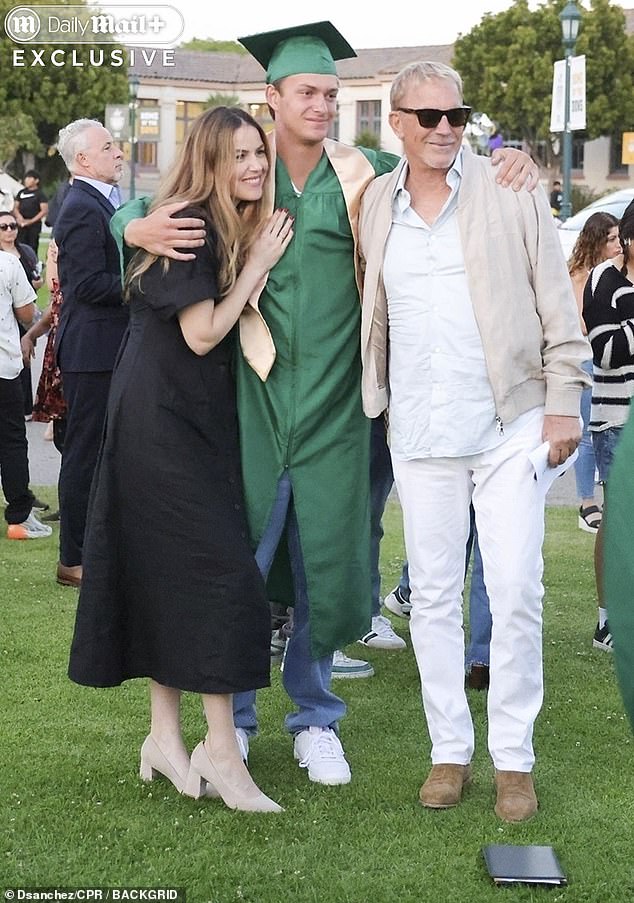 Kevin Costner and his ex-wife Christine Baumgartner kept things frosty on Friday as they separately attended their son Cayden Wyatt's high school graduation in Santa Barbara (Lily Costner, Cayden Costner and Kevin Costner pictured)