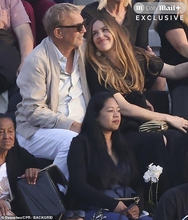 The father-daughter duo appeared in good spirits, chatting and smiling throughout the event