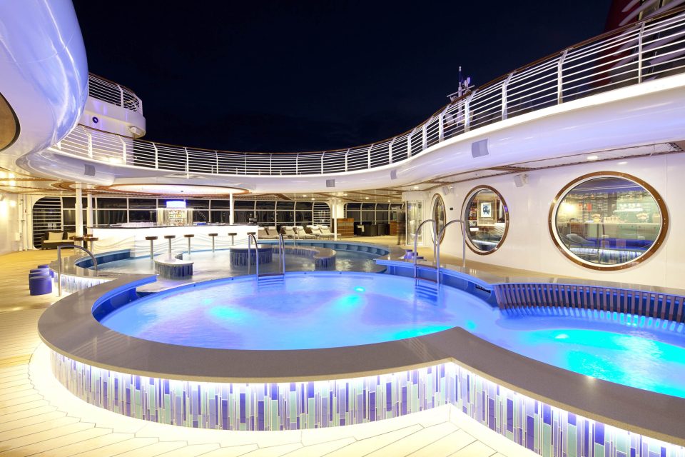 Quiet Cove Pool on the Disney Dream cruise ship at night.