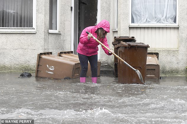 Residents struggle to stop flooding in their homes and businesses in Devon this week
