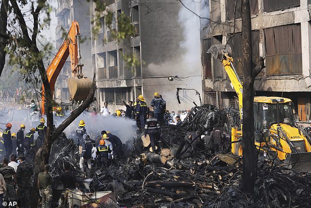 Search and rescue teams respond to the scene of a plane crash in Ahmedabad, India