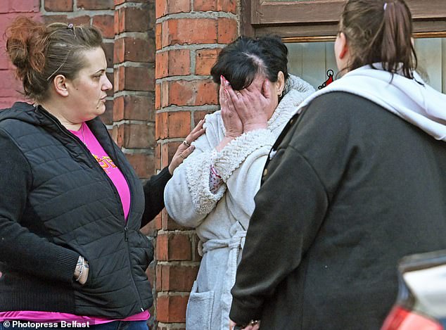 Frightened families return to their homes following the intense riots