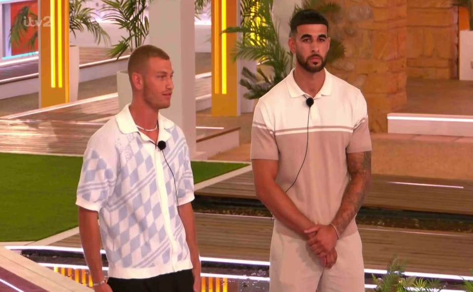 Two men standing in the Love Island villa.