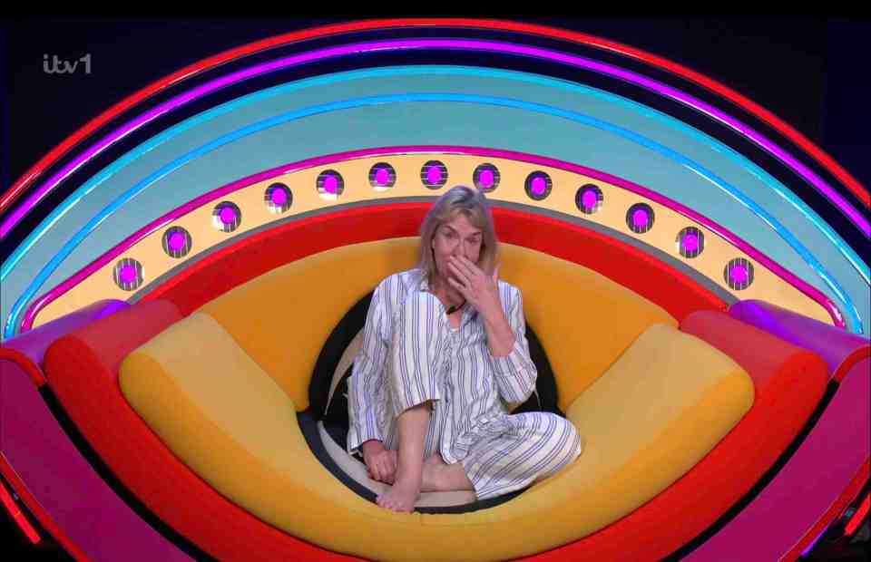 Fern Britton crying on a colorful chair.