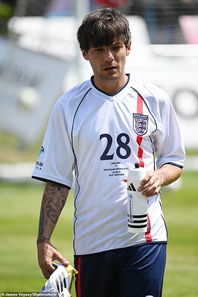 Louis had a more downcast expression as he walked across the pitch