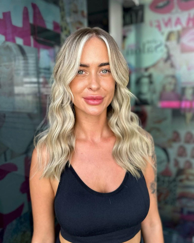 Woman with blonde balayage hair.