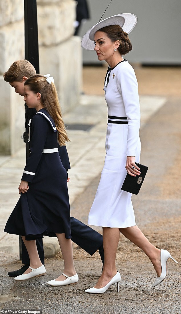 Kate was the picture of elegance and grace as she donned a crisp white structured pencil dress last June