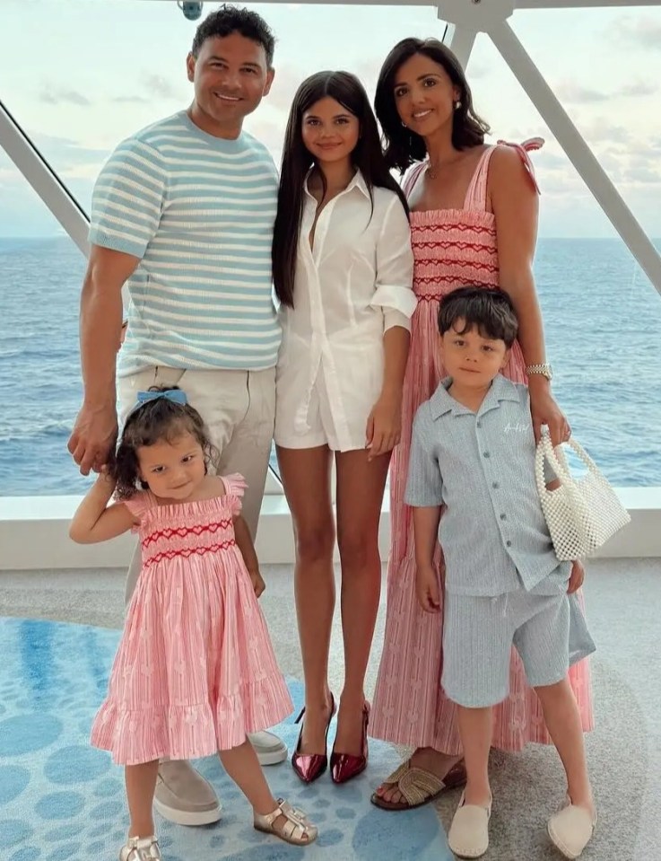 Family portrait of Ryan Thomas, Lucy Mecklenburgh, and their children.