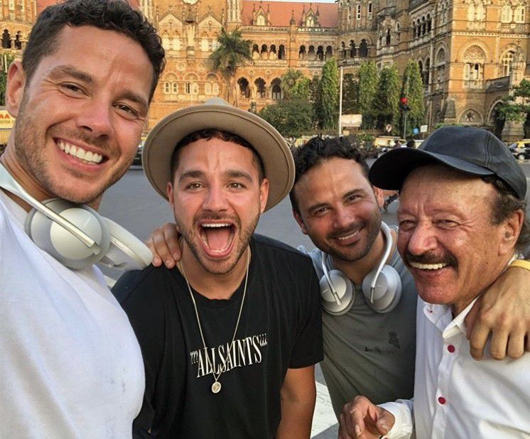 The Thomas brothers and their father in Mumbai.