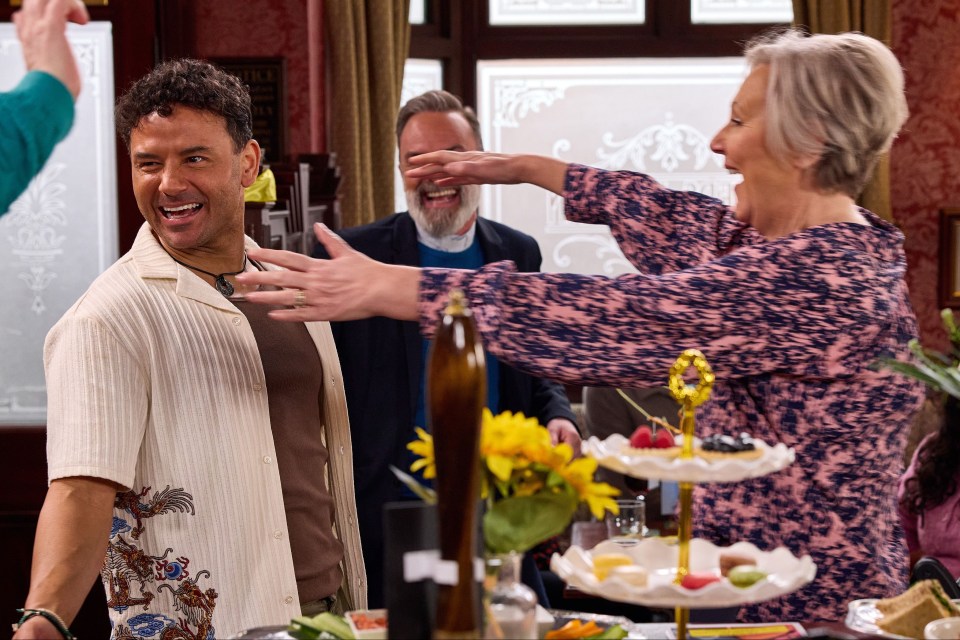 Scene from Coronation Street showing George Shuttleworth proposing to Eileen Grimshaw.