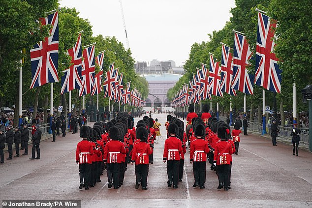 Foot Guards of the Household Division march along The Mall towards Horse Guards Parade during last year's Trooping the Colour