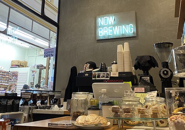 After aimlessly walking around the city with her CV and living in a hostel she was able to secure a job at a coffee shop (pictured)