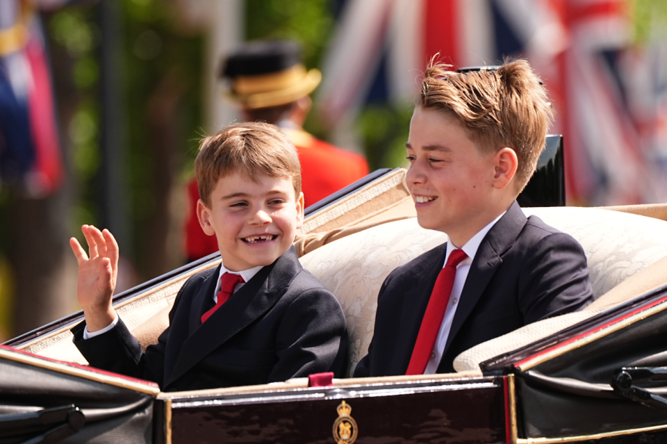 Prince Louis and Prince George in a carriage.