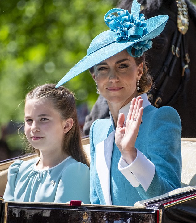 The Princess of Wales waves at royal fans on their way to the ceremony on Horseguards Parade