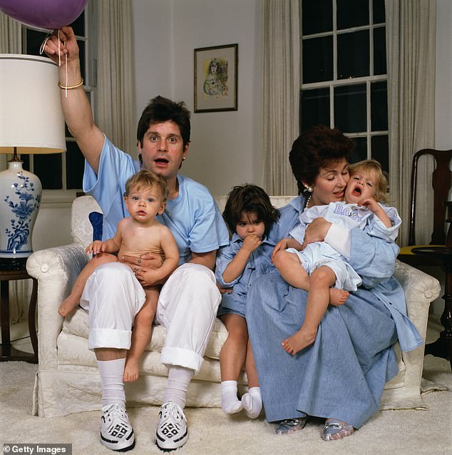 Pictured: English rock singer Ozzy Osbourne and his wife Sharon and their children Aimee, Kelly and Jack, in 1987