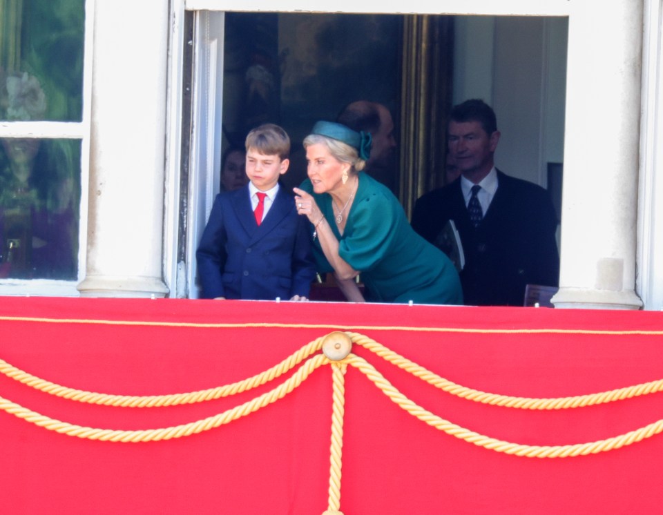 Royals on a balcony.