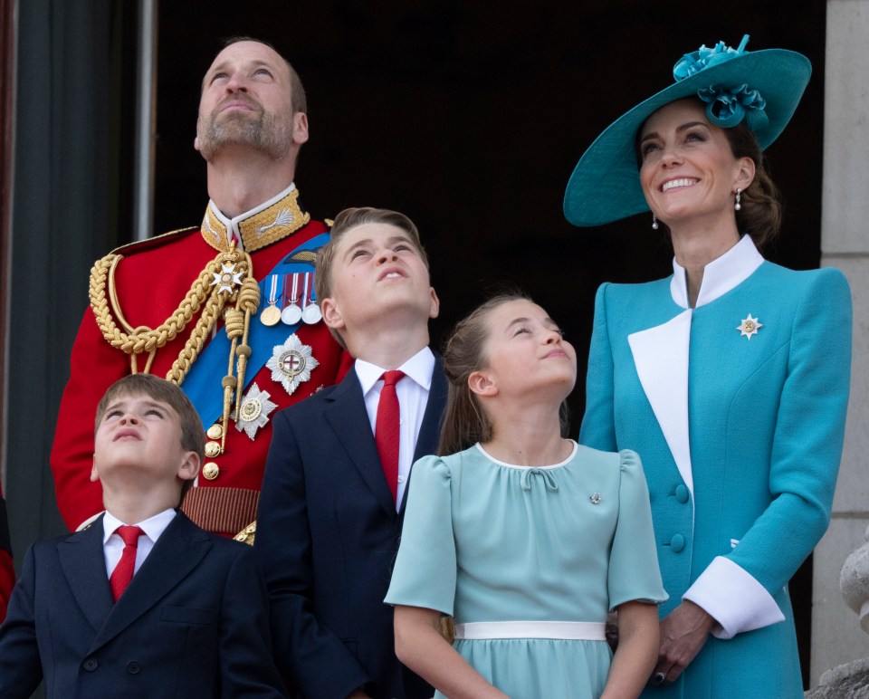 Prince William, Catherine, Princess of Wales, and their three children watching Trooping the Colour.