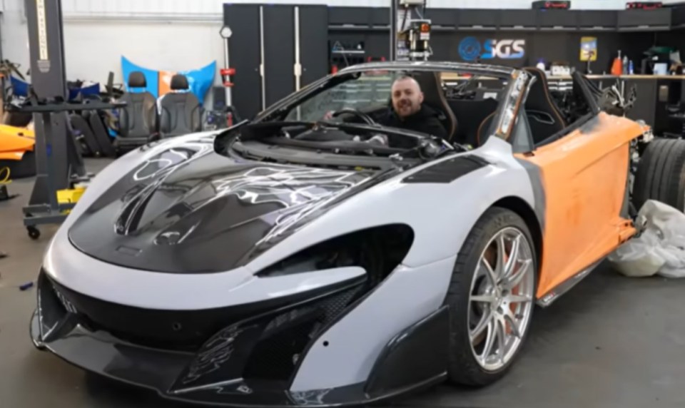 Man sitting in a DIY McLaren.