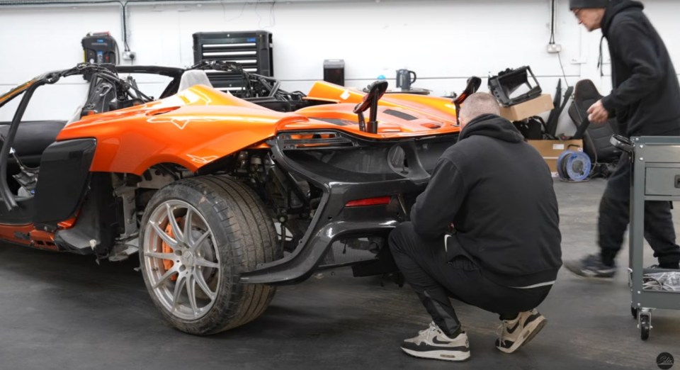 DIY McLaren being worked on in a garage.